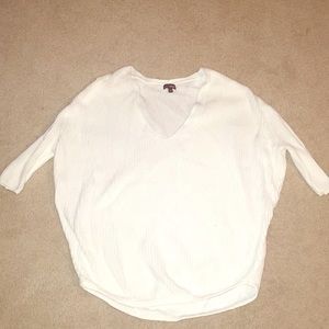 White 3/4 sleeve shirt.